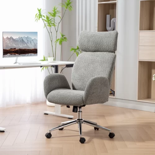 Silla de tela gris con reposacabezas en un despacho doméstico
