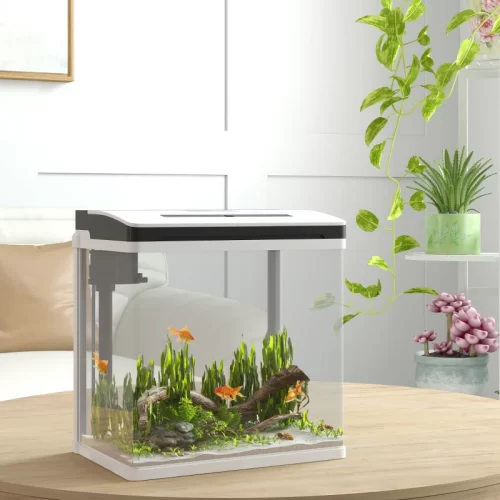 Acuario blanco con luz LED y peces dorados en mesa redonda