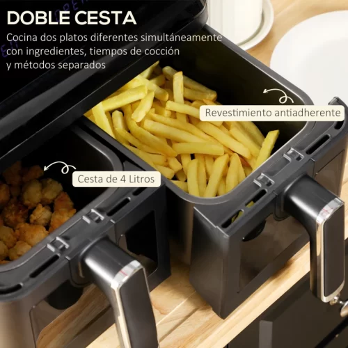 Cesta doble de una freidora de aire con patatas fritas y trozos de pollo