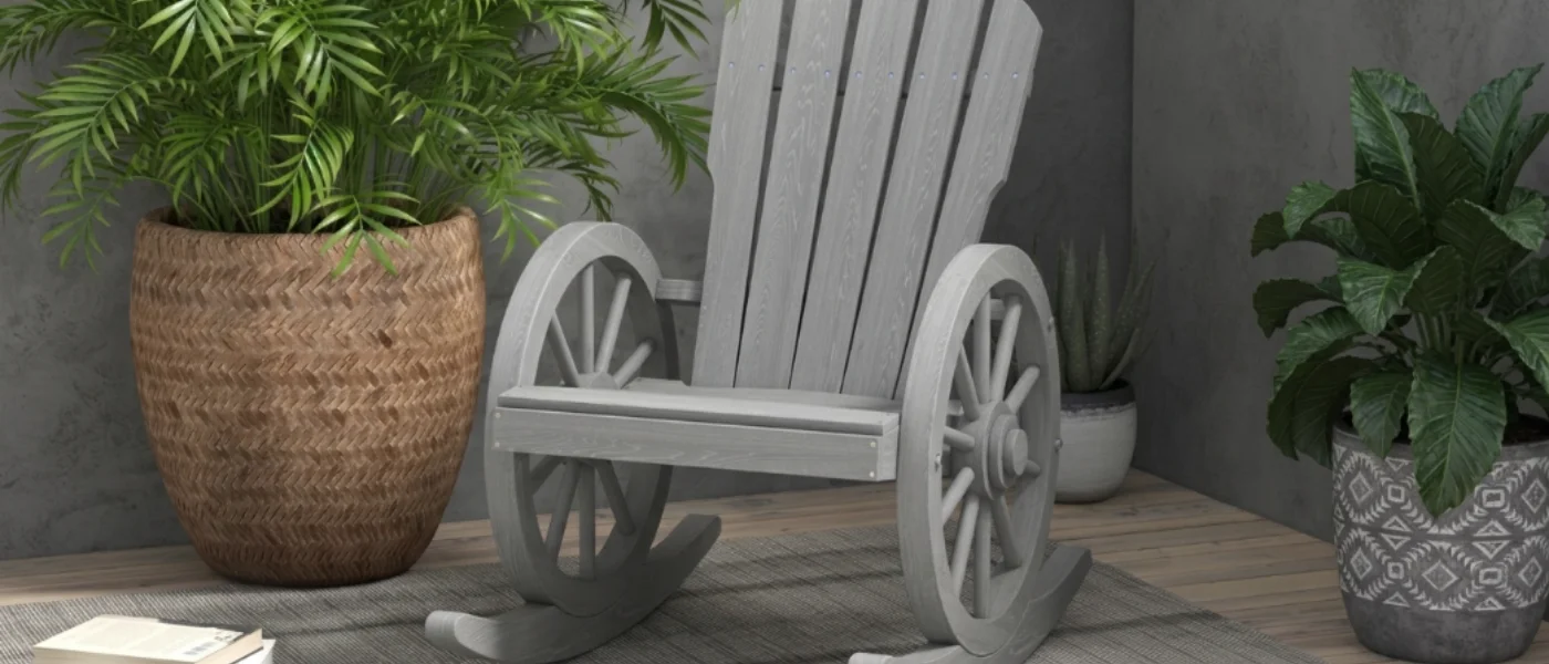 Mecedora de madera gris con ruedas de carro en terraza
