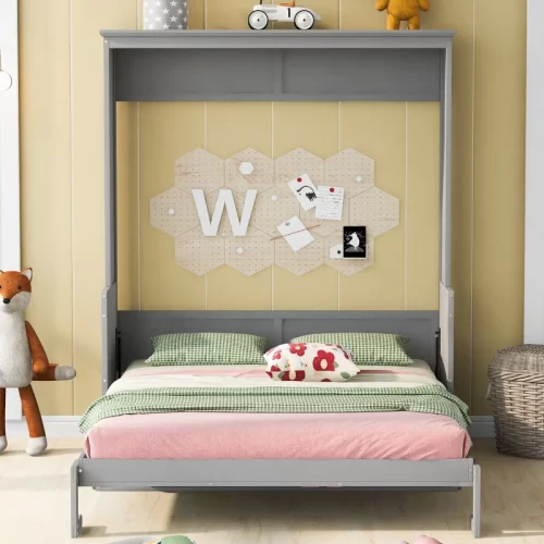 Cama con ropa de cama verde y rosa