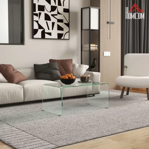 Mesa de centro transparente de cristal templado en salón